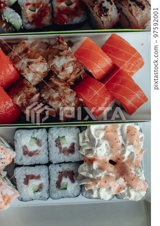 Beautiful delicious sushi. Sushi delivery Beautiful delicious sushi. Sushi delivery 97592001