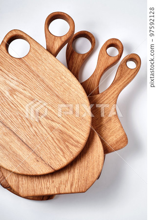different kind of handmade oak chopping board on white background different kind of handmade oak chopping board on white background 97592128