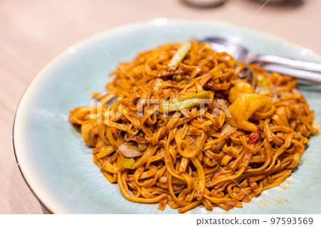 Soy sauce stir fry noodle in restaurant 97593569