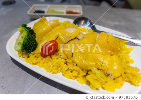 Hainanese chicken rice dish in restaurant Hainanese chicken rice dish in restaurant 97593570