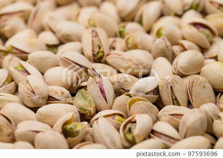 Stack of pistachio nut snack Stack of pistachio nut snack 97593696