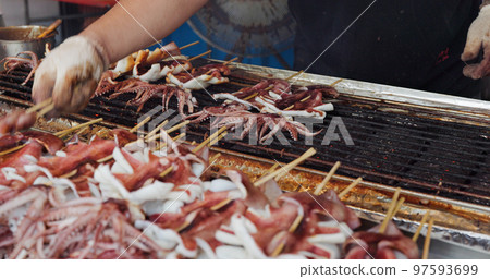 Grill squid in street market of Taiwan Grill squid in street market of Taiwan 97593699