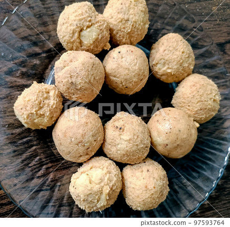 Fried crispy koftas served in a pan Fried crispy koftas served in a pan 97593764