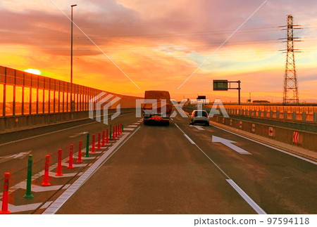 Highway at dusk 97594118