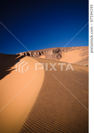 Close-up view to dunes in Tassili nAjjer national park, Algeria Close-up view to dunes in Tassili nAjjer national park, Algeria 97594195