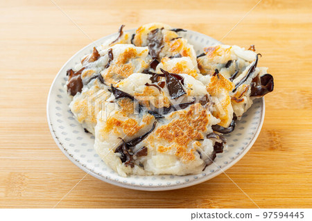 Homemade cloud ear mushroom tempura on Japanese tableware 97594445