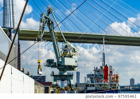Cranes unloading cargo at Sakurajima Wharf in Konohana Ward, Osaka City 97595461