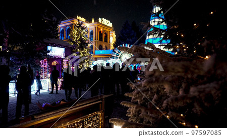 People on the street celebrate New Year, Christmas 97597085