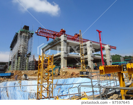 SELANGOR, MALAYSIA -JULY 6, 2022: An elevated road is under construction. Reinforced concrete is used for the structure. Construction is done in stages according to the sequence of works. SELANGOR, MALAYSIA -JULY 6, 2022: An elevated road is under construction. Reinforced concrete is used for the structure. Construction is done in stages according to the sequence of works. 97597645