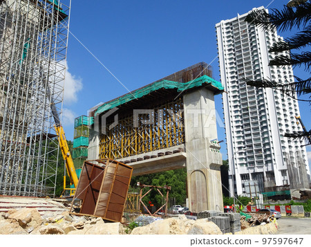 SELANGOR, MALAYSIA -JULY 6, 2022: An elevated road is under construction. Reinforced concrete is used for the structure. Construction is done in stages according to the sequence of works. SELANGOR, MALAYSIA -JULY 6, 2022: An elevated road is under construction. Reinforced concrete is used for the structure. Construction is done in stages according to the sequence of works. 97597647