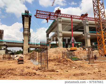 SELANGOR, MALAYSIA -JULY 6, 2022: An elevated road is under construction. Reinforced concrete is used for the structure. Construction is done in stages according to the sequence of works. SELANGOR, MALAYSIA -JULY 6, 2022: An elevated road is under construction. Reinforced concrete is used for the structure. Construction is done in stages according to the sequence of works. 97597661