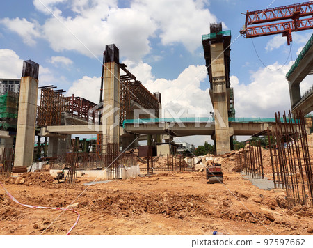 SELANGOR, MALAYSIA -JULY 6, 2022: An elevated road is under construction. Reinforced concrete is used for the structure. Construction is done in stages according to the sequence of works. SELANGOR, MALAYSIA -JULY 6, 2022: An elevated road is under construction. Reinforced concrete is used for the structure. Construction is done in stages according to the sequence of works. 97597662