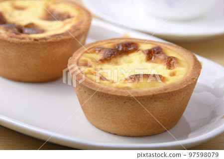 Portuguese egg tarts on a plate 97598079