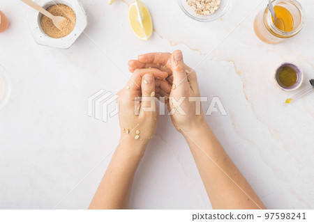 Flatlay with homemade beauty products: fresh ingredients like oat, honey, lemon, banana, egg, olive Flatlay with homemade beauty products: fresh ingredients like oat, honey, lemon, banana, egg, olive 97598241