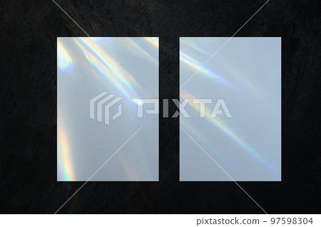 Two empty vertical rectangle poster mockup on black background Two empty vertical rectangle poster mockup on black background 97598304
