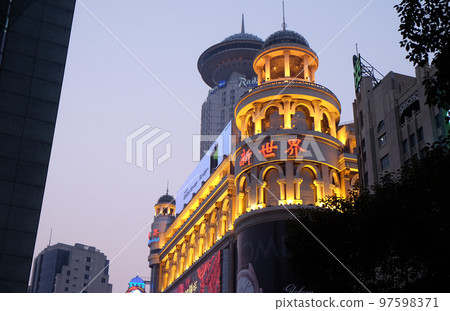 New World City Shopping Center at main pedestrian shopping street Nanjing Road in Shanghai, China New World City Shopping Center at main pedestrian shopping street Nanjing Road in Shanghai, China 97598371