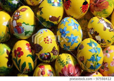 Easter eggs exposed in front of the parish church of St. Stephen in Wasseralfingen, Germany Easter eggs exposed in front of the parish church of St. Stephen in Wasseralfingen, Germany 97598412