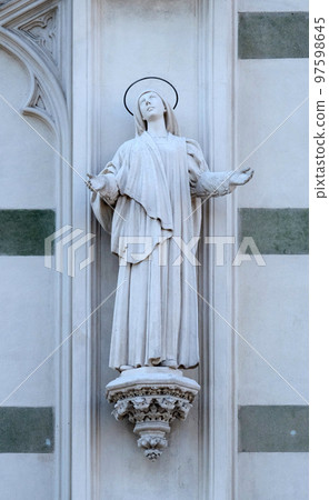 Statue of St. Margaret Mary Alacoque on the facade of Sacro Cuore del Suffragio church in Rome, Italy Statue of St. Margaret Mary Alacoque on the facade of Sacro Cuore del Suffragio church in Rome, Italy 97598645