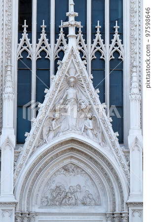 Sacred Heart of Jesus between two Angels up and Souls of Purgatory down, Sacro Cuore del Suffragio church in Rome, Italy 97598646