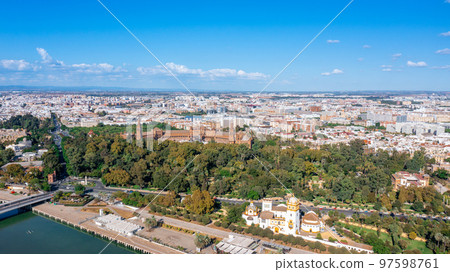 Aerial view of the Spanish city of Seville in the Andalusia region on the river Guadaquivir overlooking Plaza de Espana and Parque Maria 97598761
