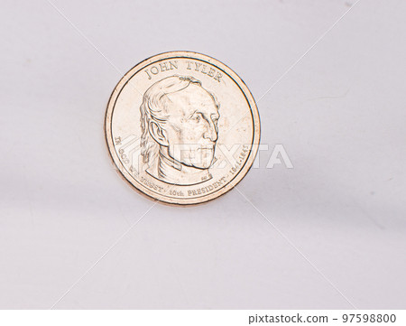 The four most commonly used American Coins. A quarter, dime, nickle, and penny isolated on a white background The four most commonly used American Coins. A quarter, dime, nickle, and penny isolated on a white background 97598800