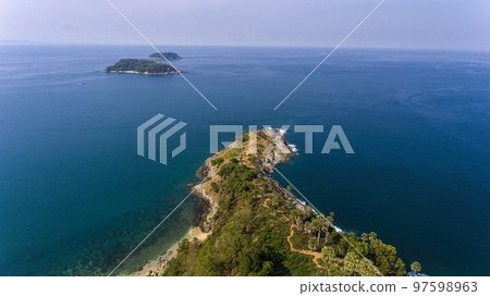 Promthep Cape is one of the most photographed locations in Phuket. Phromthep cape viewpoint at blue sea sky in Phuket, Thailand. 97598963