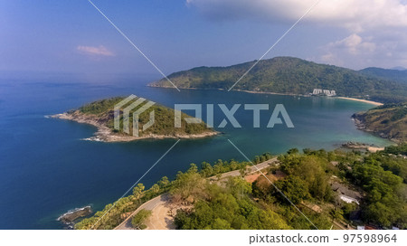 Promthep Cape is one of the most photographed locations in Phuket. Phromthep cape viewpoint at blue sea sky in Phuket, Thailand. 97598964