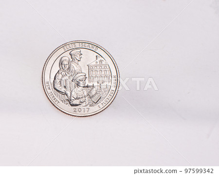 US Dollar coins President series $1 golden colored. The United States Mint honors our nation's presidents. Overhead flat lay 97599342