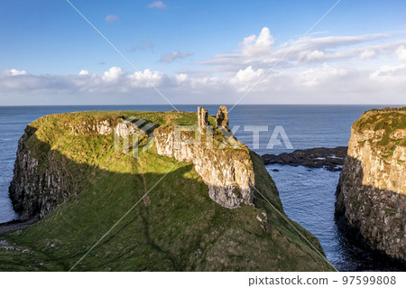Dunseverick Castle is located west of the village of Dunseverick, in County Antrim, in Northern Ireland. 97599808