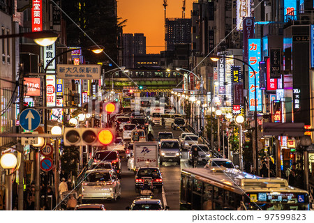 Tokyo cityscape in Japan Looking at Okubo station and the cityscape shining in the sunset from Shin-Okubo station Tokyo cityscape in Japan Looking at Okubo station and the cityscape shining in the sunset from Shin-Okubo station 97599823