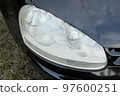 Slightly aged headlight lens 97600251