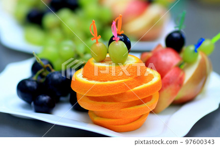 variety of fruits on the table in the restaurant 97600343