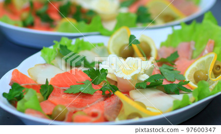 cold snacks on the table in the restaurant 97600347