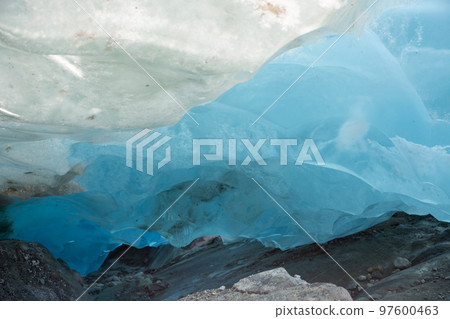 A cave under the blue ice of the Aletsch glacier near the Marjelensee (Valais, Switzerland) 97600463