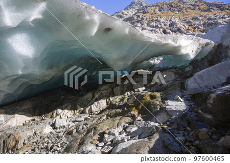 A cave under the blue ice of the Aletsch glacier near the Marjelensee (Valais, Switzerland) 97600465