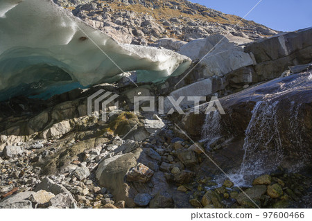 A cave under the blue ice of the Aletsch glacier near the Marjelensee (Valais, Switzerland) 97600466
