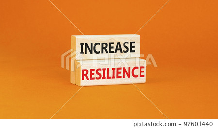 Increase resilience symbol. Concept word Increase resilience typed on wooden blocks. Beautiful orange table orange background. Business and increase resilience concept. Copy space. 97601440