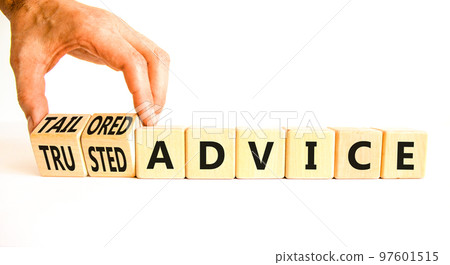 Tailored or trusted advice symbol. Concept words Tailored advice and Trusted advice on wooden cubes. Businessman hand. Beautiful white background. Business tailored trusted advice concept. Copy space. 97601515