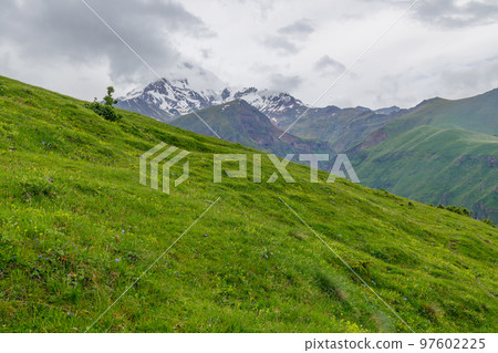 Kazbek or Kazbegi mountain,near the Gergeti Trinity Church ,village Stepantsminda in Georgia ,At an altitude of 2170 meters, Kazbek or Kazbegi mountain,near the Gergeti Trinity Church ,village Stepantsminda in Georgia ,At an altitude of 2170 meters, 97602225