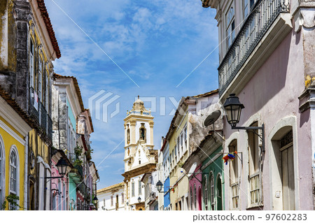 Old houses with colorful facades and historic church tower in Pelourinho Old houses with colorful facades and historic church tower in Pelourinho 97602283