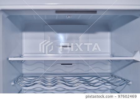 Empty refrigerator shelves Empty refrigerator shelves 97602469