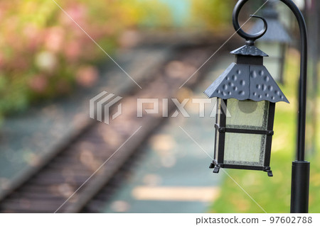 Lamp lantern in entertainment railway attraction Lamp lantern in entertainment railway attraction 97602788