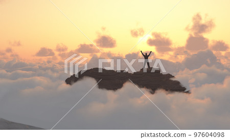 Man on a mountain peak 97604098