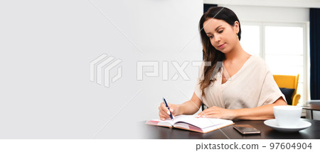 Attractive, beautiful woman working at home 97604904