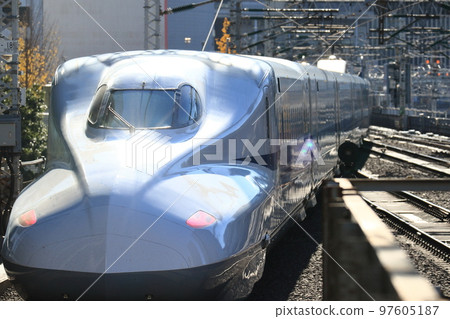 Shinkansen leaving Tokyo Station Shinkansen leaving Tokyo Station 97605187