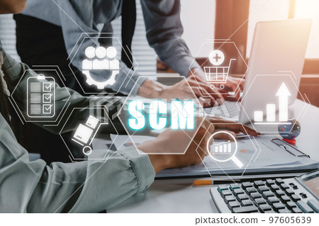 SCM, Supply Chain Management concept, Business person team working on laptop computer with Supply Chain Managemen icon on virtual screen background, plan, distribution, procurement, and profit. 97605639
