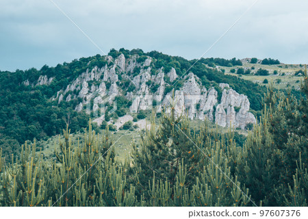 The mountain and the turquoise sky. The mountain and the turquoise sky. 97607376