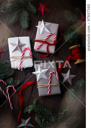 Christmas gift box with candy and star. 97607560