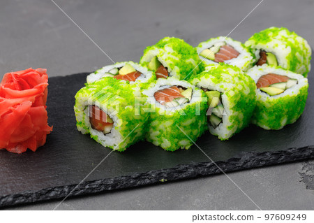 California sushi roll with green caviar close up 97609249