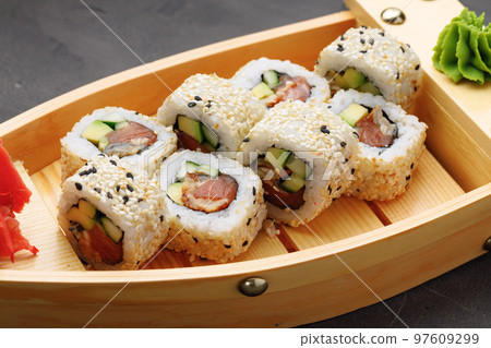 Japanese sushi roll on plate close up Japanese sushi roll on plate close up 97609299